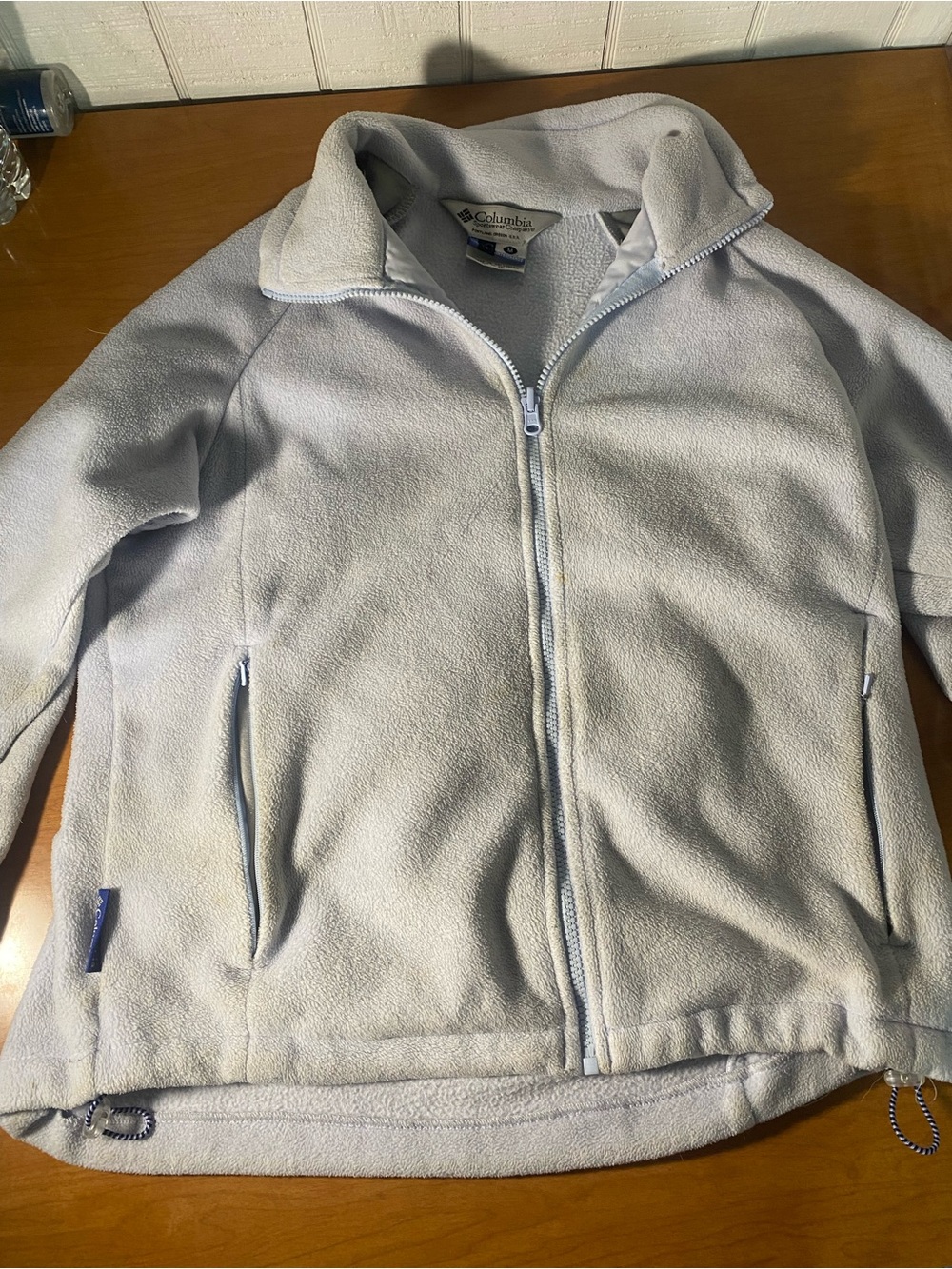 Columbia label on fleece garment